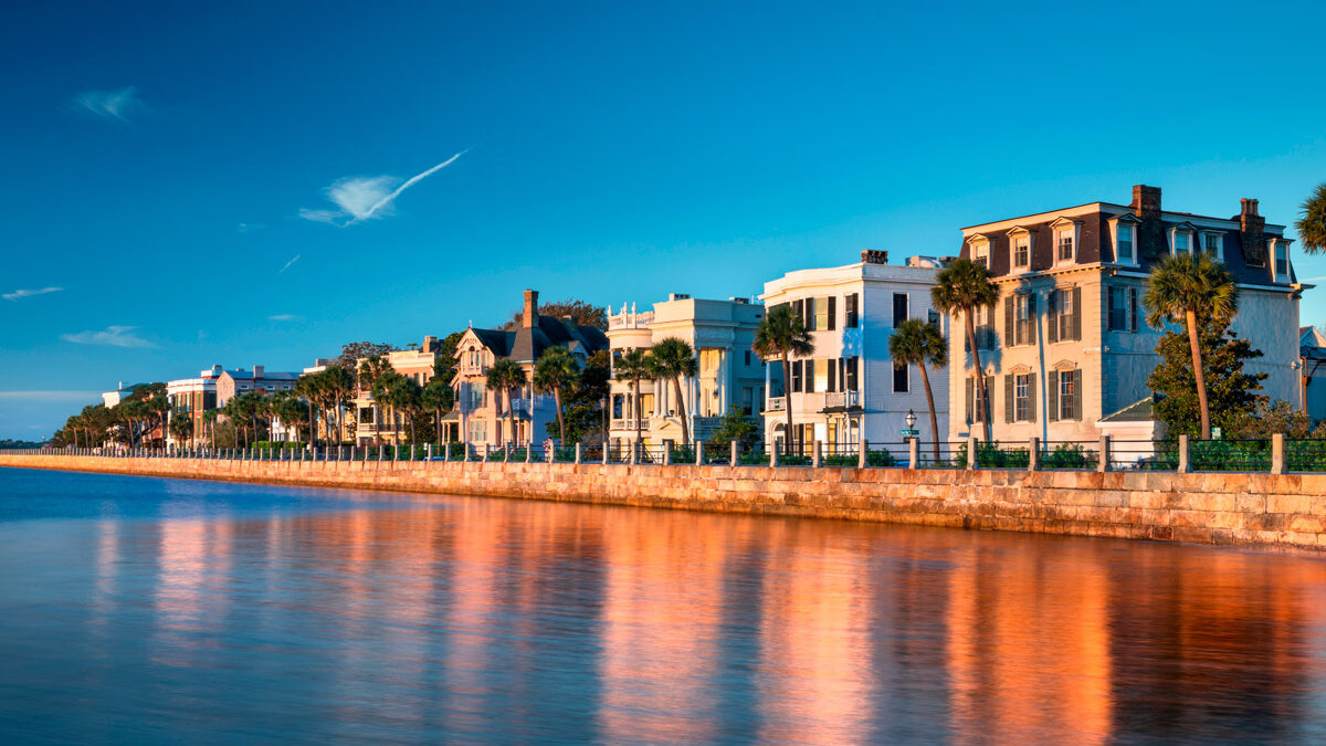 Historic waterfront homes along the Battery in Charleston, SC at sunset